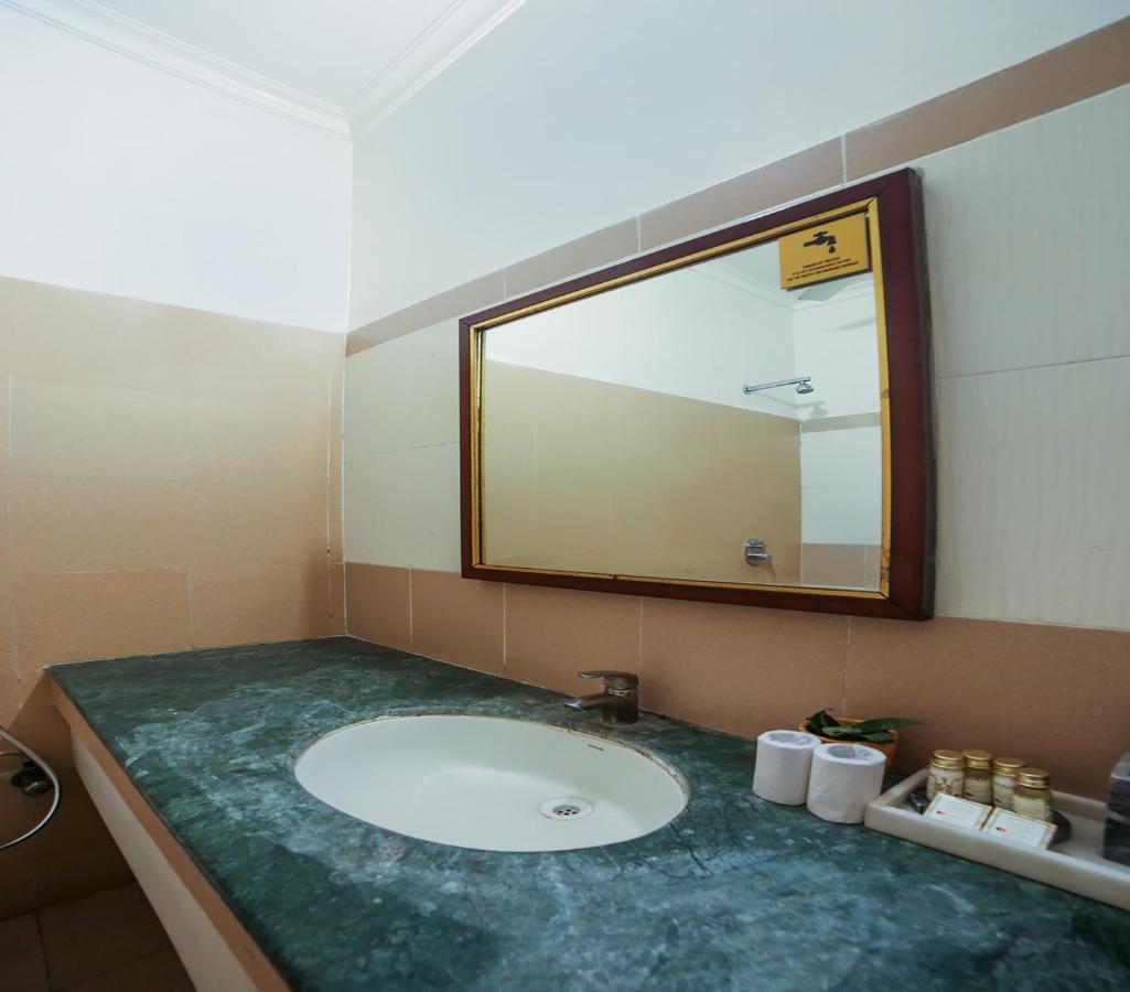 אגרה Capital O 10953 Dayal Lodge - A Boutique Hotel מראה חיצוני תמונה